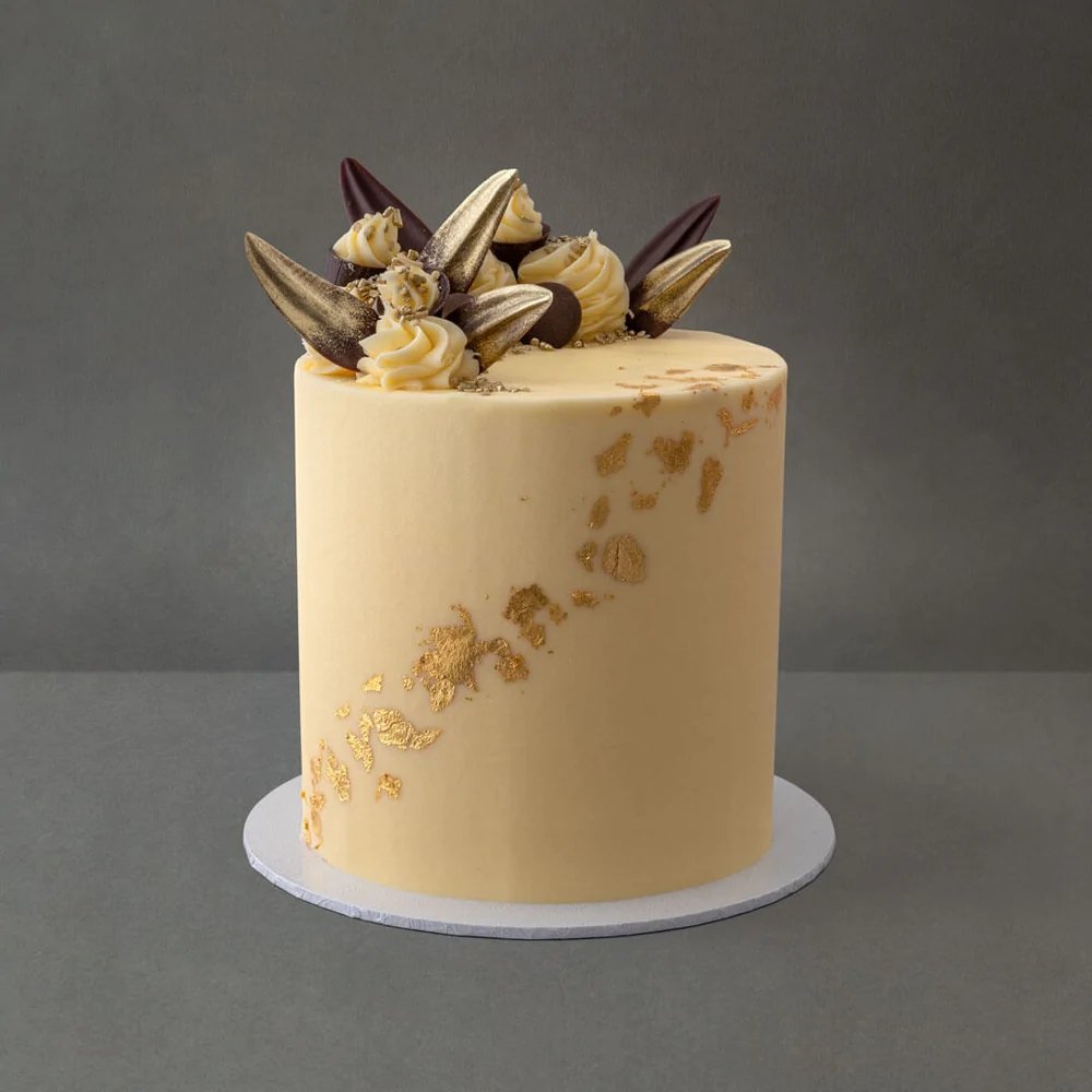 White chocolate, caramel & gold celebration cake - cakery wonderland eventscakery wonderland eventscakery wonderland eventsCakeswhite choco caramel 23cm